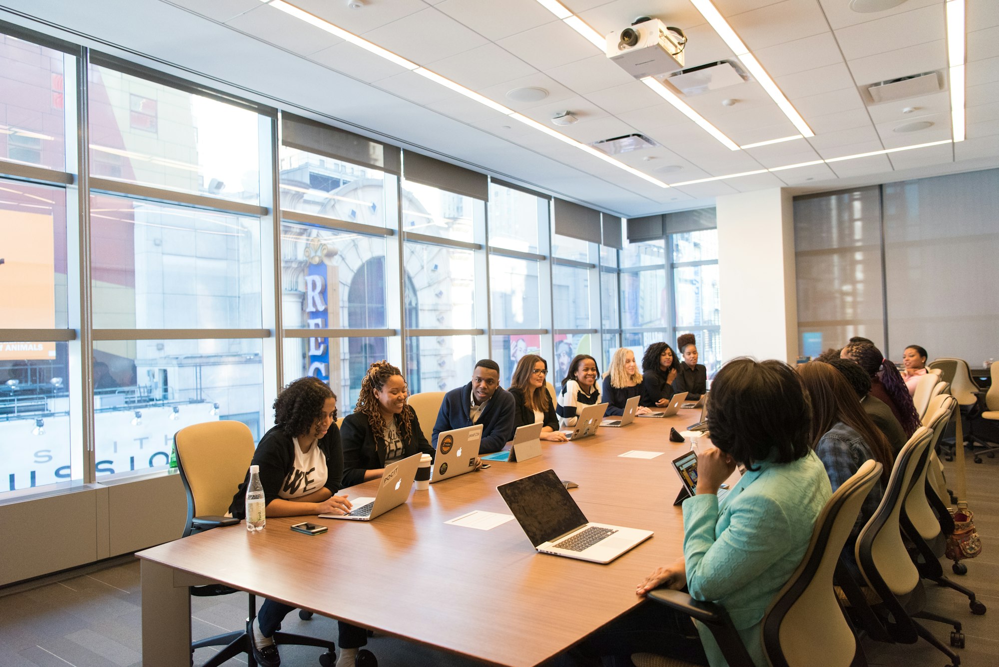 A diverse team working together in a meeting room.
